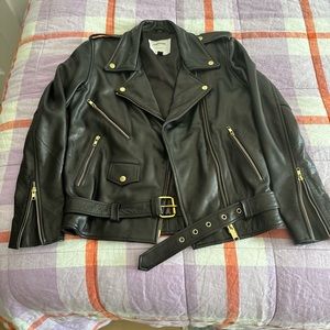 Understated leather - pristine condition leather jacket. Looks brand new!